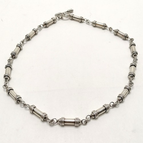 580 - Silver hallmarked heavy gauge fancy tubular link necklace with t-bar catch - 44cm & 52g