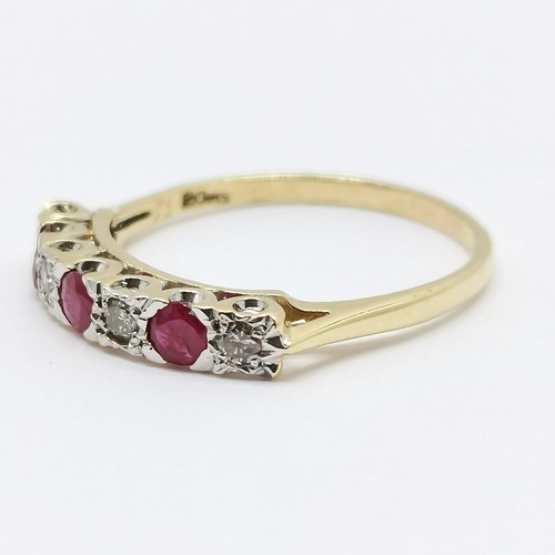 585 - 18ct hallmarked gold ruby (3) & diamond (4) stone set ring - size T & 2.7g total weight