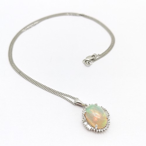 591 - Iliana 18ct white gold large opal / diamond (baguette & brilliant cut) pendant (2.5cm drop) on a 9ct... 