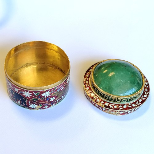 592 - Unmarked high carat gold (touch tests as 22ct) circular lidded box with large cabochon emerald (appr... 