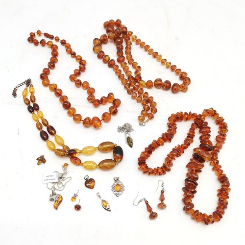 599 - Qty of amber jewellery inc silver fox pendant on chain, necklaces (longest 90cm), earrings, pendants... 