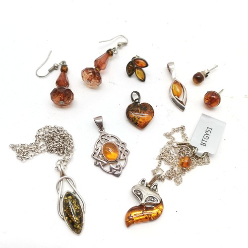 599 - Qty of amber jewellery inc silver fox pendant on chain, necklaces (longest 90cm), earrings, pendants... 