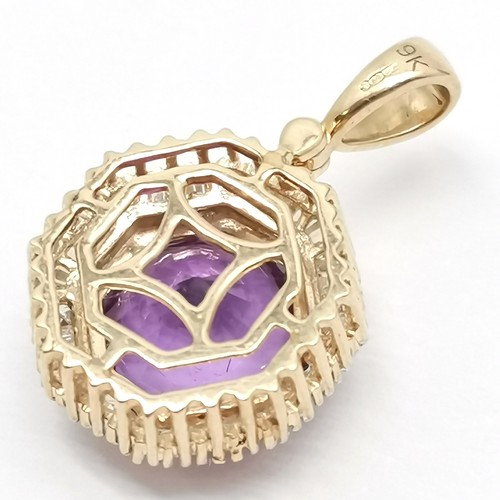 631 - 9ct hallmarked gold baguette diamond & octagonal amethyst pendant - 14mm across & 2.9g total weight