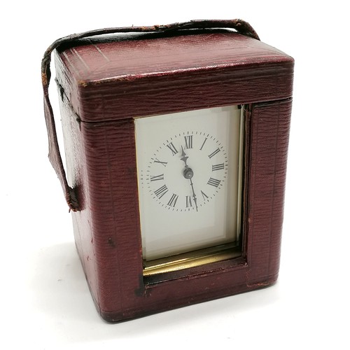 664 - Antique brass cased carriage clock in original red Moroccan leather travel case (13cm high x 10cm x ... 