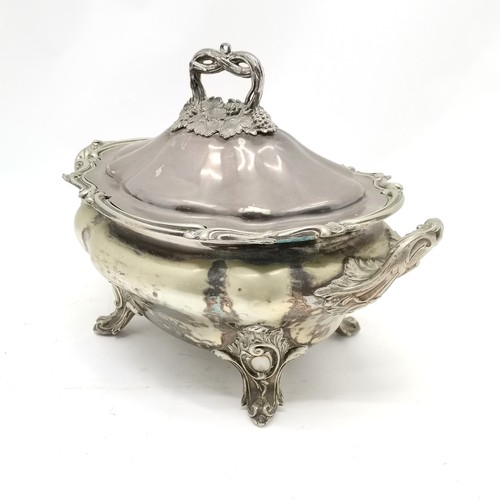 711 - Large EPNS 2 handled lidded tureen in Rococo style on 4 feet with grape detail to handle (28cm high ... 