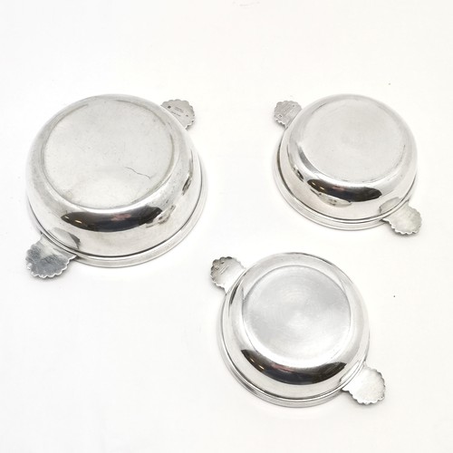 713 - 3 heavy gauge silver plated round dishes with shell detailed handles - largest 16cm diameter