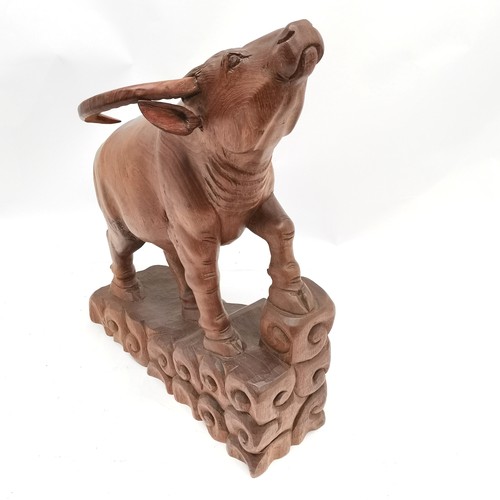 15 - Large Oriental carved hardwood figure of a water buffalo 52cm high x 38cm long x 13cm wide