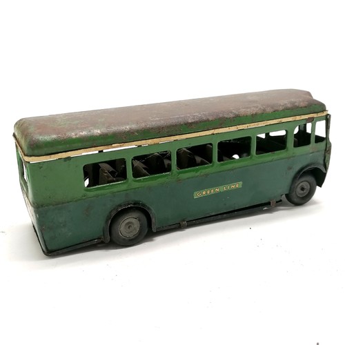 53 - Tr-ang minic Green line clockwork bus - 18cm long with obvious rust / wear