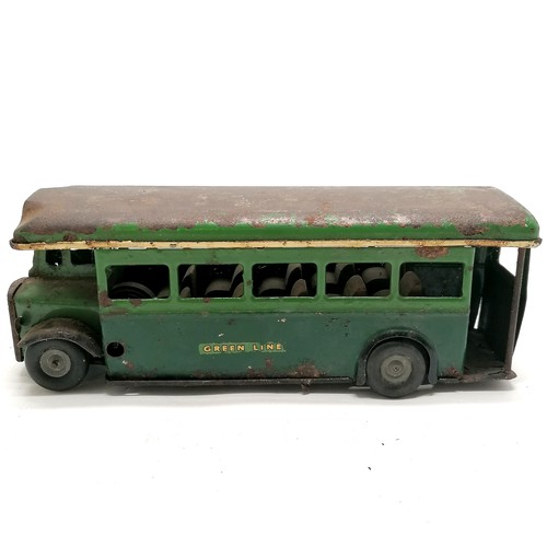 53 - Tr-ang minic Green line clockwork bus - 18cm long with obvious rust / wear