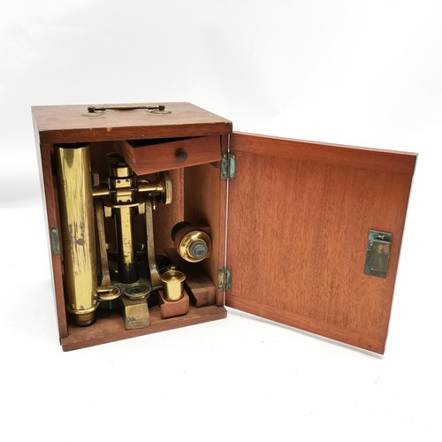 75 - Antique brass & steel microscope in original mahogany case with spare / extra lenses - box is 25cm x... 