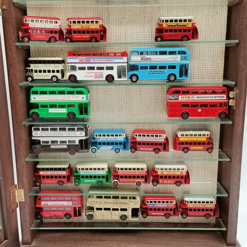 98 - Wooden display cabinet with 21 x toy buses (inc Corgi) - 65cm x 50cm x 10cm deep