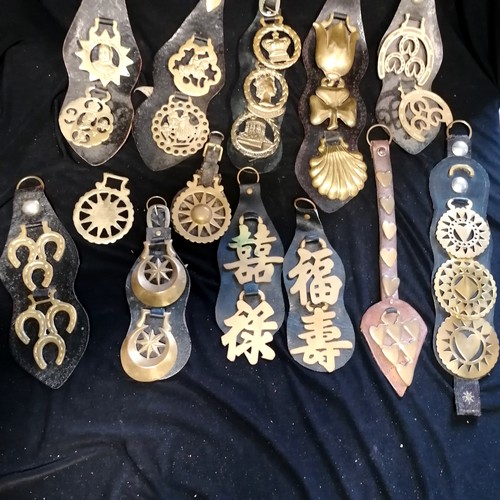 101 - Large lifetime collection of horse brasses - mostly on leather straps inc antique, RSPCA, monarchs, ... 