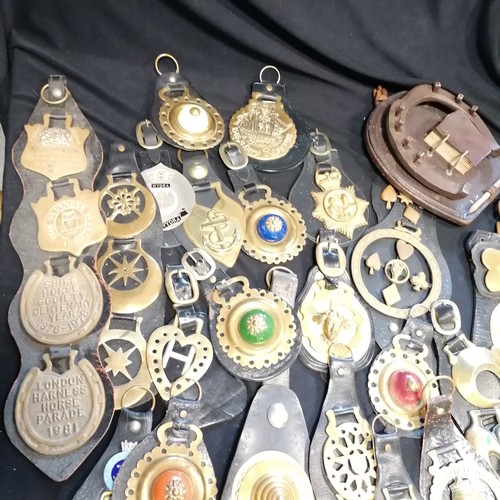 101 - Large lifetime collection of horse brasses - mostly on leather straps inc antique, RSPCA, monarchs, ... 