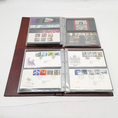 131 - 2 x Royal Mail albums i) presentation packs FV £125+ ii) @90 x FDC's 1998-2006