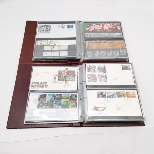 131 - 2 x Royal Mail albums i) presentation packs FV £125+ ii) @90 x FDC's 1998-2006