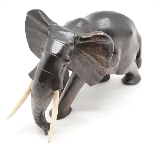 163 - Carved hardwood figure of an elephant 36cm long x 25 cm high