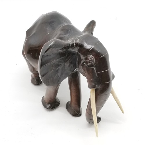 163 - Carved hardwood figure of an elephant 36cm long x 25 cm high