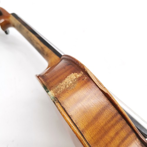 167 - An early 20th century Stainer violin patent number 23140 60cm total length, with bow and in an antiq... 