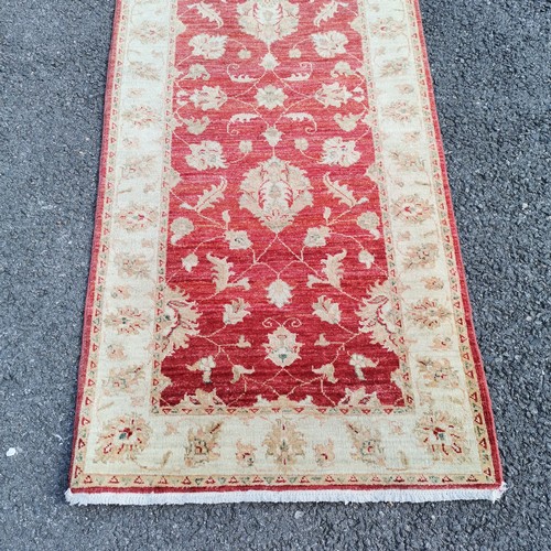 171 - Red grounded wool runner - 370cm x 82cm