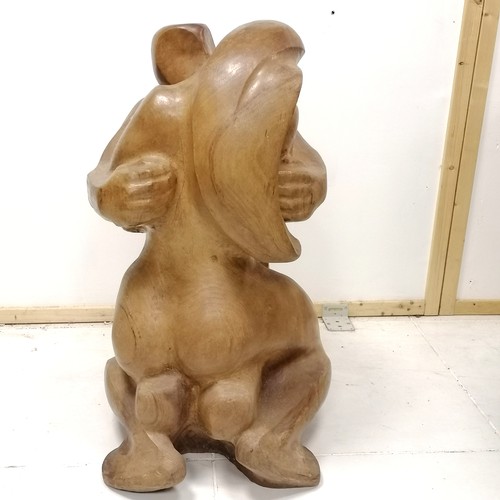 175 - Large scale wooden sculpture of a kiss monogrammed E M B dated 1974 - 85cm high x 50cm across