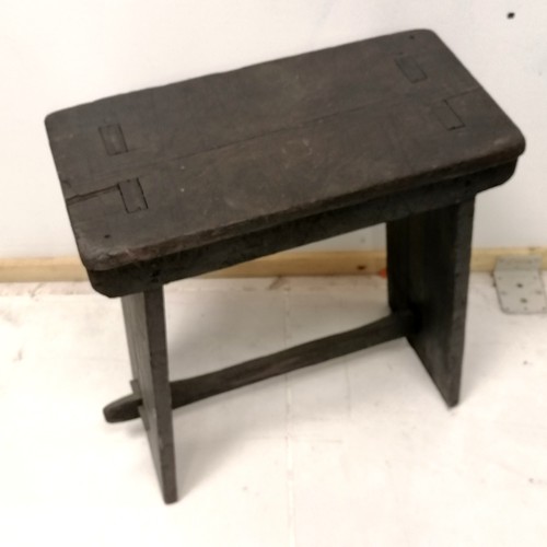 176 - Black painted rustic wooden stool 52cm high x 46cm wide x 21cm deep