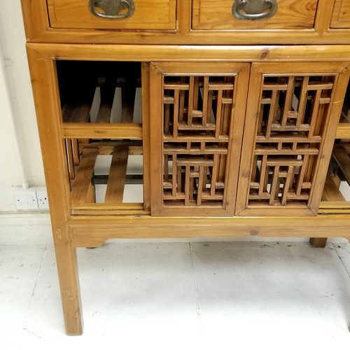 177 - Chinese wooden 2 part food cupboard, the base has 4 smal sliding screen doors and the top consists o... 