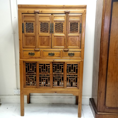 177 - Chinese wooden 2 part food cupboard, the base has 4 smal sliding screen doors and the top consists o... 