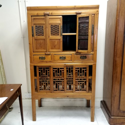 177 - Chinese wooden 2 part food cupboard, the base has 4 smal sliding screen doors and the top consists o... 