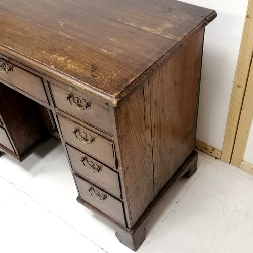 178 - Antique oak small kneehole desk on bracket feet with a brush slide 94cm long x 68cm high x 48cm wide... 