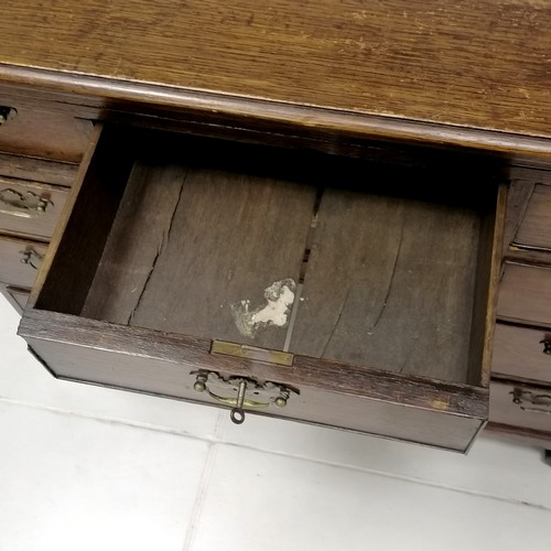 178 - Antique oak small kneehole desk on bracket feet with a brush slide 94cm long x 68cm high x 48cm wide... 