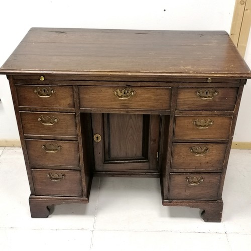 178 - Antique oak small kneehole desk on bracket feet with a brush slide 94cm long x 68cm high x 48cm wide... 