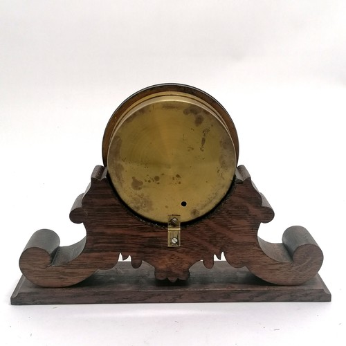 208 - Antique aneroid barometer with curved thermometer on hand carved oak stand - 21cm high x 32cm wide x... 