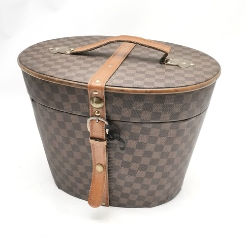 224 - 3 wooden containers with Louis Vuitton style fabric coverings largest 38cm accross x 29cm high