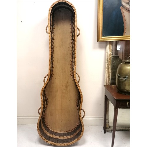 257 - Unusual basket coffin in a guitar shape - missing it's lid 180cm long x 55cm wide x 36cm high