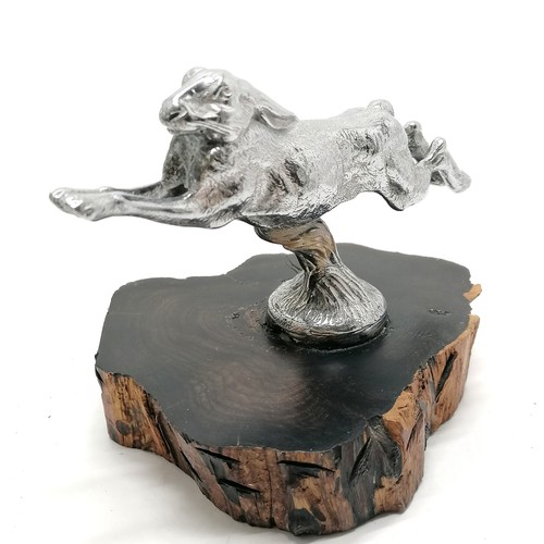 296 - Vintage leaping hare car mascot in silvered bronze with impressed mark FL and mounted on a hardwood ... 