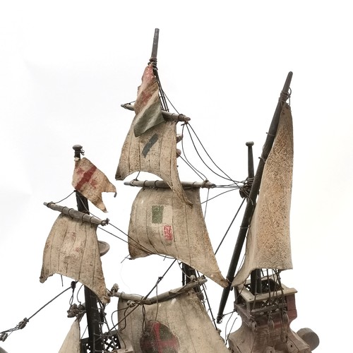 318 - Vintage carved wooden galleon with hand painted detail on a wooden stand - Total height 57cm - has a... 