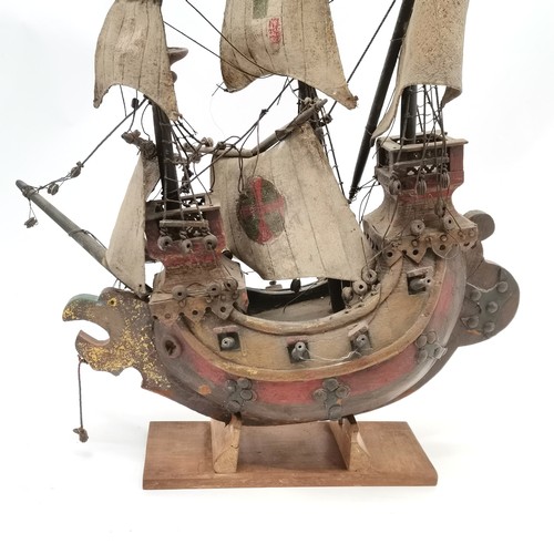 318 - Vintage carved wooden galleon with hand painted detail on a wooden stand - Total height 57cm - has a... 