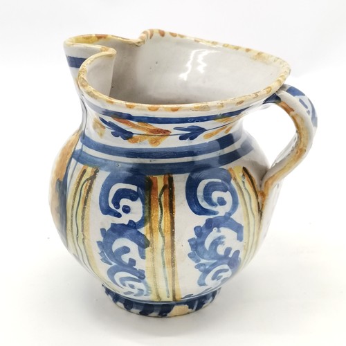 322 - Antique Continental faience / tin glaze jug inscribed Brugghe ~ 12cm high with some frittering to th... 