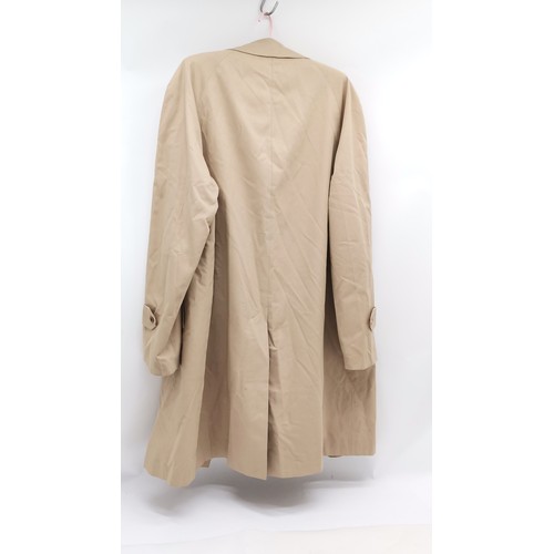 324 - Burberry's ladies rain coat 56cm pit to pit x 100cm long - Has some marks