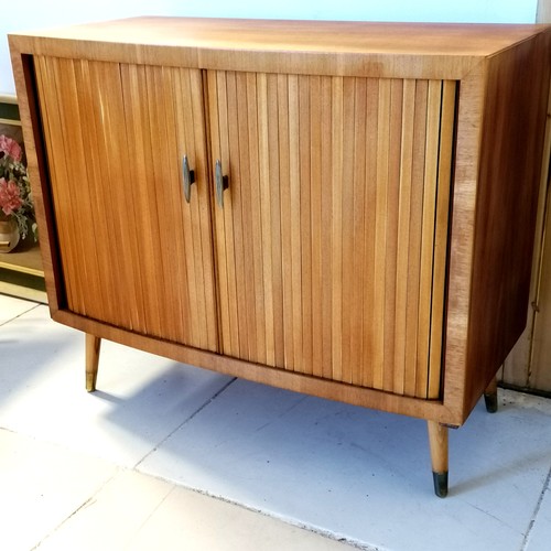 326 - Mid century teak record cabinet with a 2 door tambour front - 79cm wide x 38cm deep x 67cm high