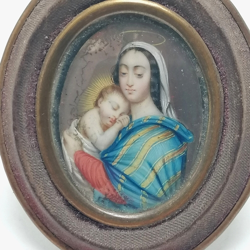 331 - Antique hand painted portrait miniature depicting Mary with Jesus in an oval easel stand frame with ... 