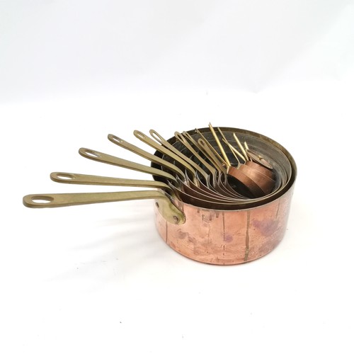 339 - Graduated set of copper & brass handled saucepans - largest 20.5cm diameter & smallest 3.5cm diamete... 