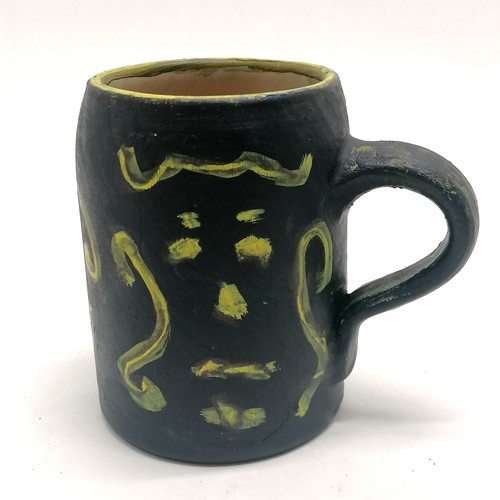 2 - Studio pottery hand painted tankard with face detail signed JP - 12.5cm high - 1 small paint loss wi... 