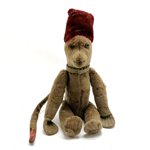 4 - Antique toy jointed monkey wearing a fez style hat & has leather button eyes - 40cm tall and obvious... 