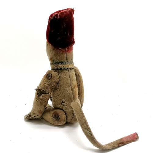 4 - Antique toy jointed monkey wearing a fez style hat & has leather button eyes - 40cm tall and obvious... 