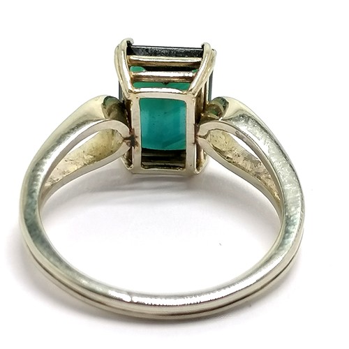 423 - 18ct marked white gold green tourmaline ? ring - size N½ & 3.8g total weight - SOLD ON BEHALF OF THE... 