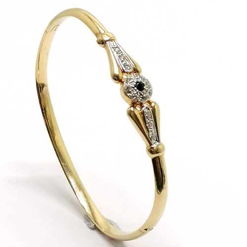 424 - 14ct marked gold sapphire / white stone set bangle - 6cm across & 7.9g total weight - SOLD ON BEHALF... 