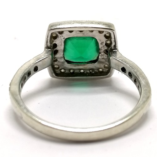 463 - 9ct hallmarked white gold green tourmaline (?) / diamond stone set cluster ring with diamond set sho... 