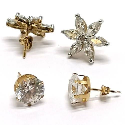 468 - 2 x pairs of 9ct gold (unmarked) white stone set earrings inc flower design (1.4cm) - 4.3g total wei... 