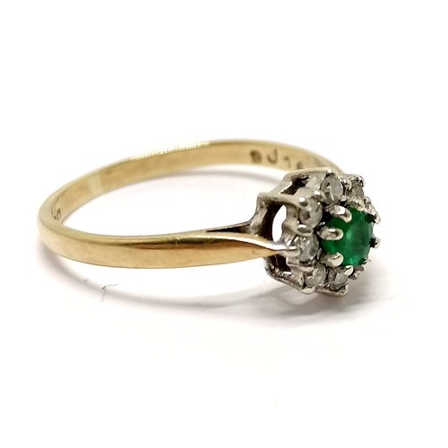 488 - 9ct hallmarked gold emerald & diamond cluster ring - size K & 1.3g total weight